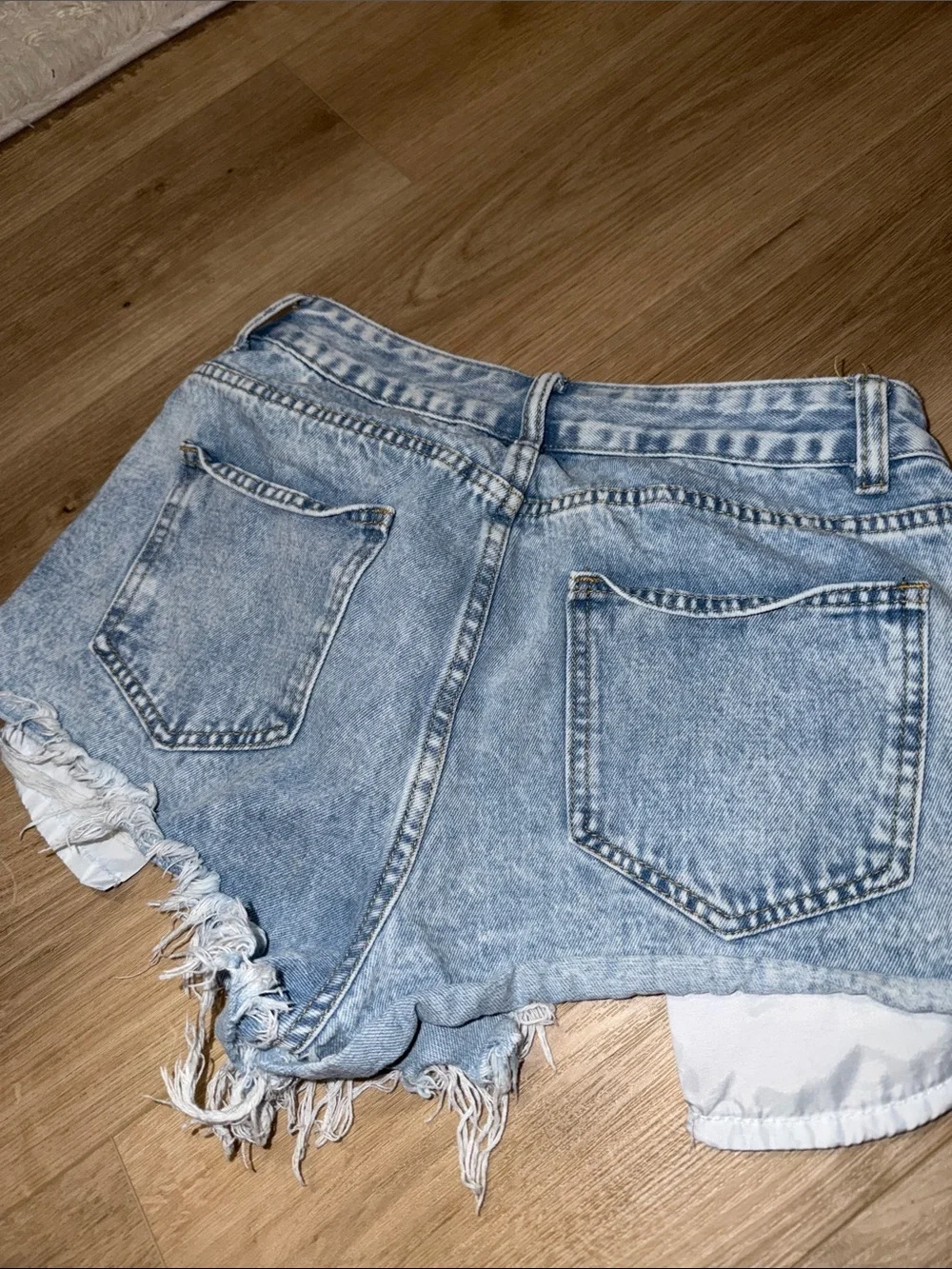 Light Wash Distressed Denim Shorts - Women